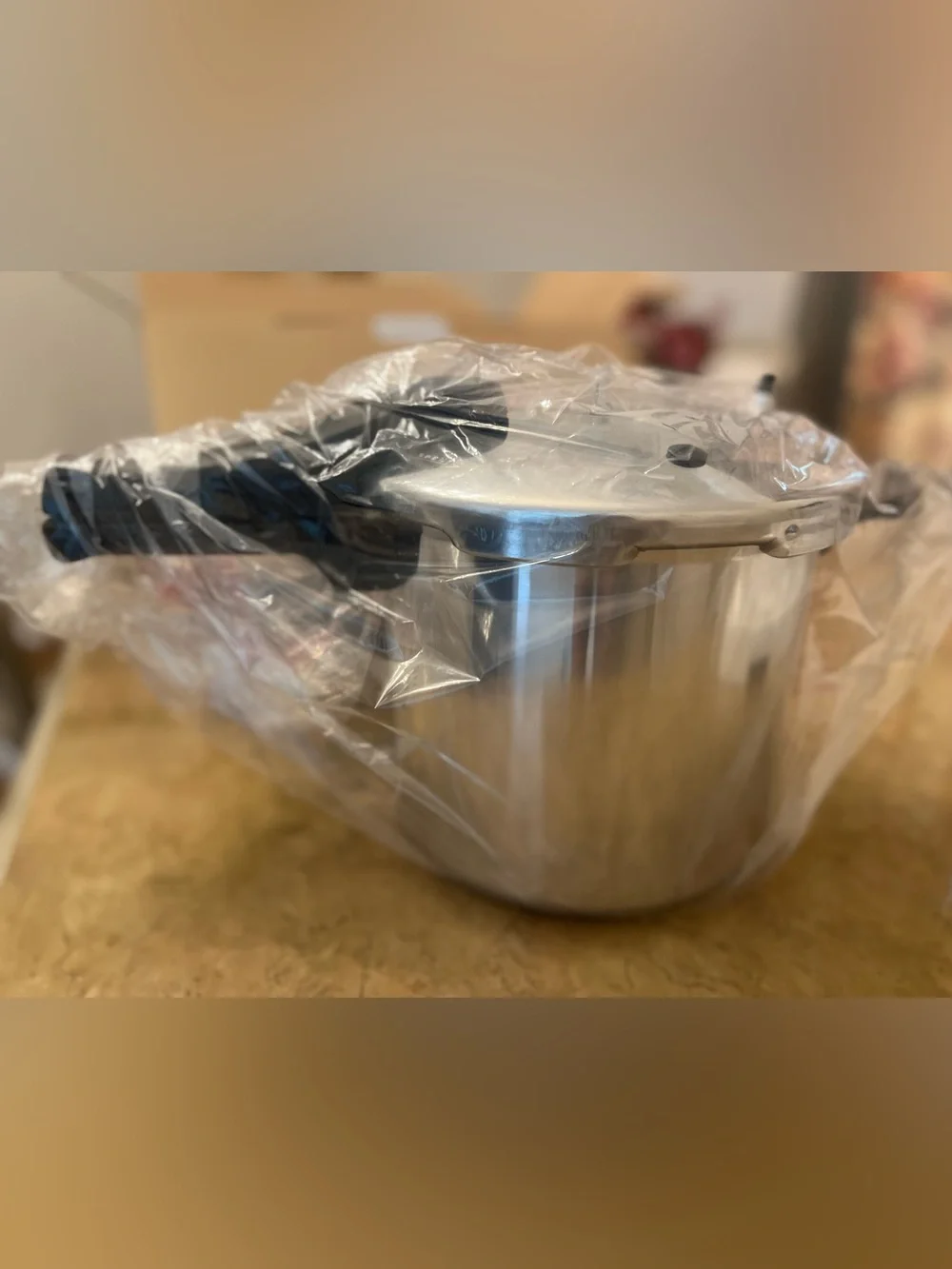 New - 6 Quart Stainless Steel Pressure Cooker with Black Handles
